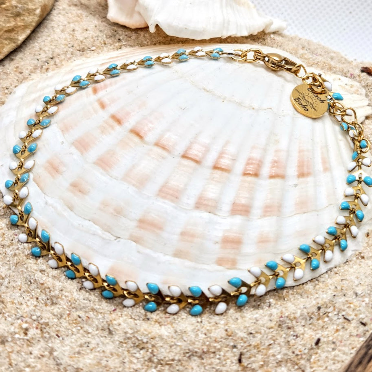Necklace with blue and white beads on a seashell