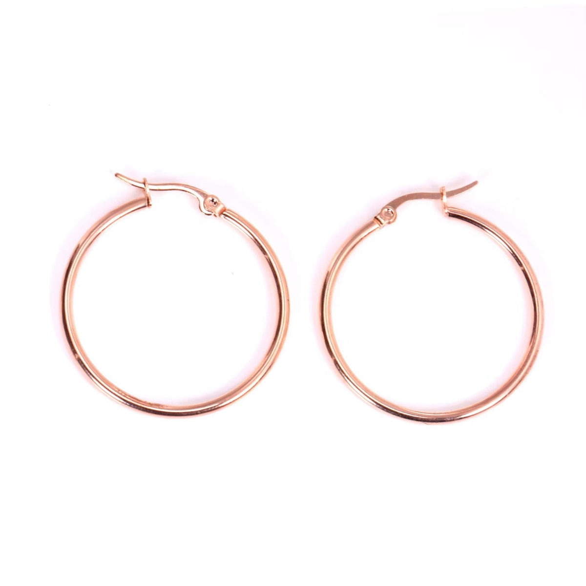 A pair of rose gold hoop earrings with a simple polished finish and fishhook clasps, displayed on a clean white background.