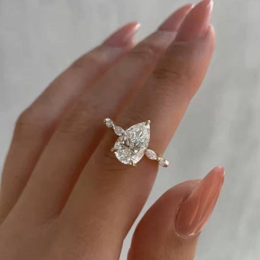 Diamond ring on a hand with a neutral background