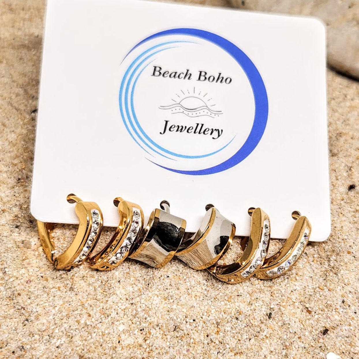 Jewellery set on a card with 'Beach Boho Jewellery' branding on a sandy background