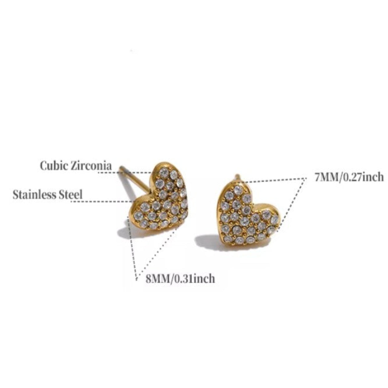 Heart-shaped gold earrings with cubic zirconia on a white background