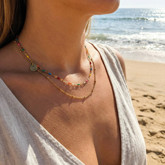 Woman wearing a colorful necklace on a beach