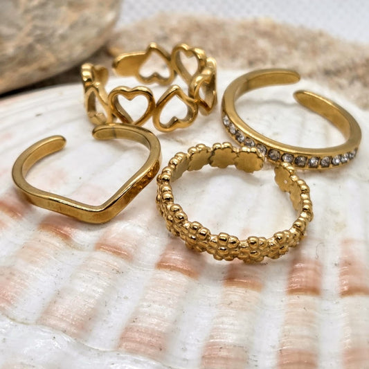 Set of gold rings on a shell